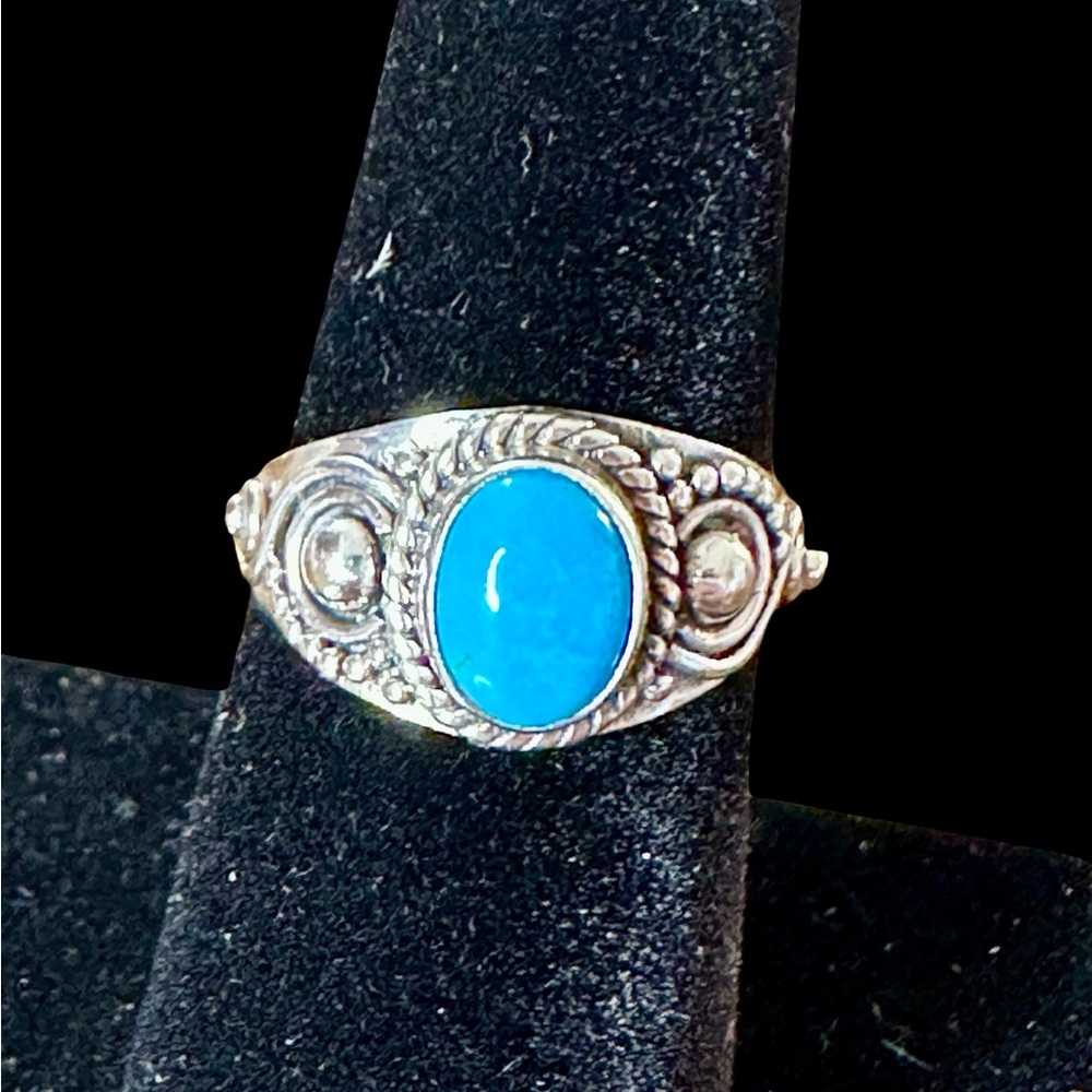 Intricate Silver Ring with Vibrant Blue Stone